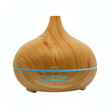 Plug-in essential oil diffuser with wood grain finish, providing 6-12 hours of mist for home or workspace.